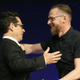 Star Trek Beyond producer J.J. Abrams and co-writer Simon Pegg embrace on stage at CinemaCon. The image’s official description does not mention Star Trek Beyond. (Image: Todd Williamson/Getty Images for CinemaCon).